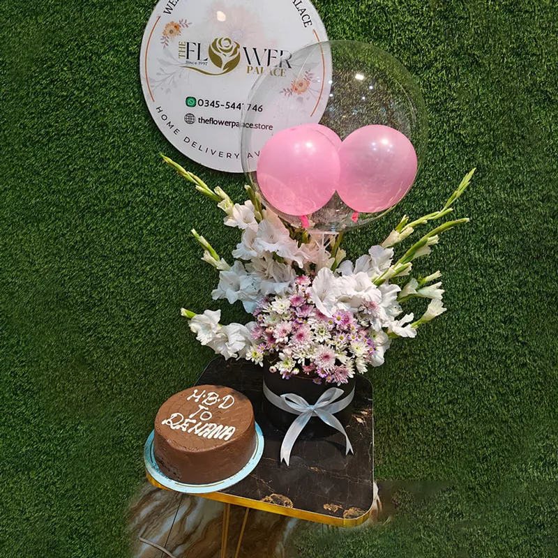 Tall white Gladiolus and purple flowers box arrangement with a "Happy Birthday" cake and pink balloons