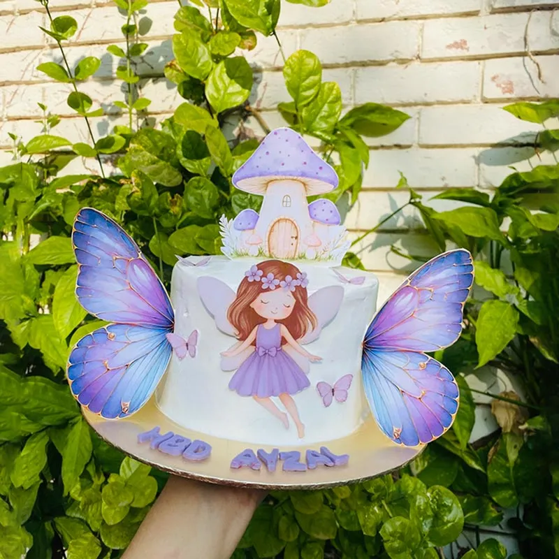 Enchanted garden cake with 3D butterflies and miniature fairy mushroom house