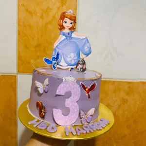 Modern square anniversary cake with minimalist red hearts and gold Love topper